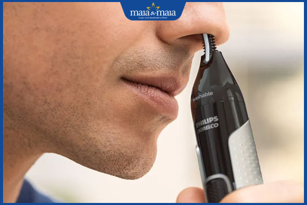 dùng máy tỉa lông mũi