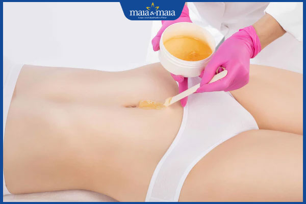 thực hiện wax lông bụng