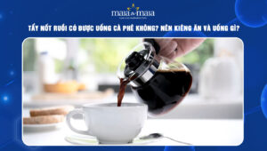 tẩy nốt ruồi có được uống cà phê không