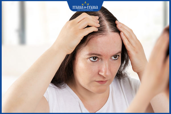 nữ giới rụng tóc